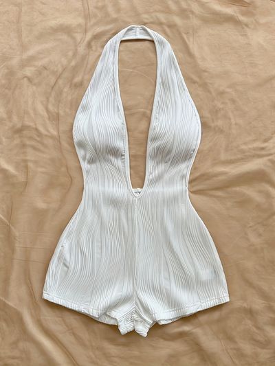 A Women's Vacation-Style White Bodysuit with a Wavy