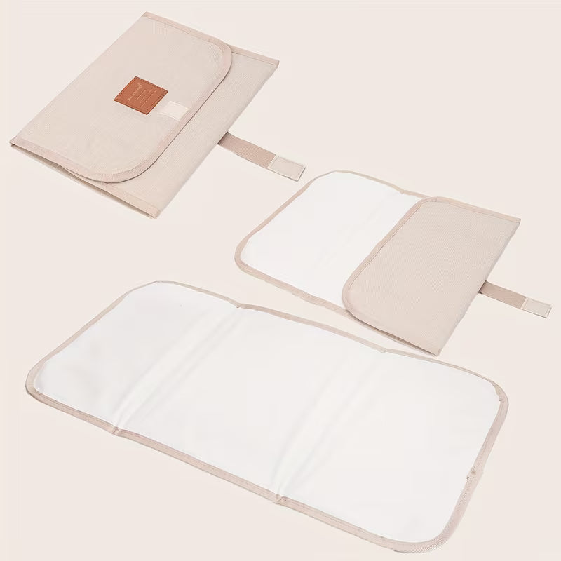 A Mommy Portable Foldable Diaper Changing Pad for